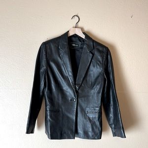 Vintage real leather blazer with minimal wear and tear